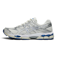 Uptown Asics GEL-CUMULUS 16 running shoe in cream and illusion blue with mesh and synthetic leather overlays.
